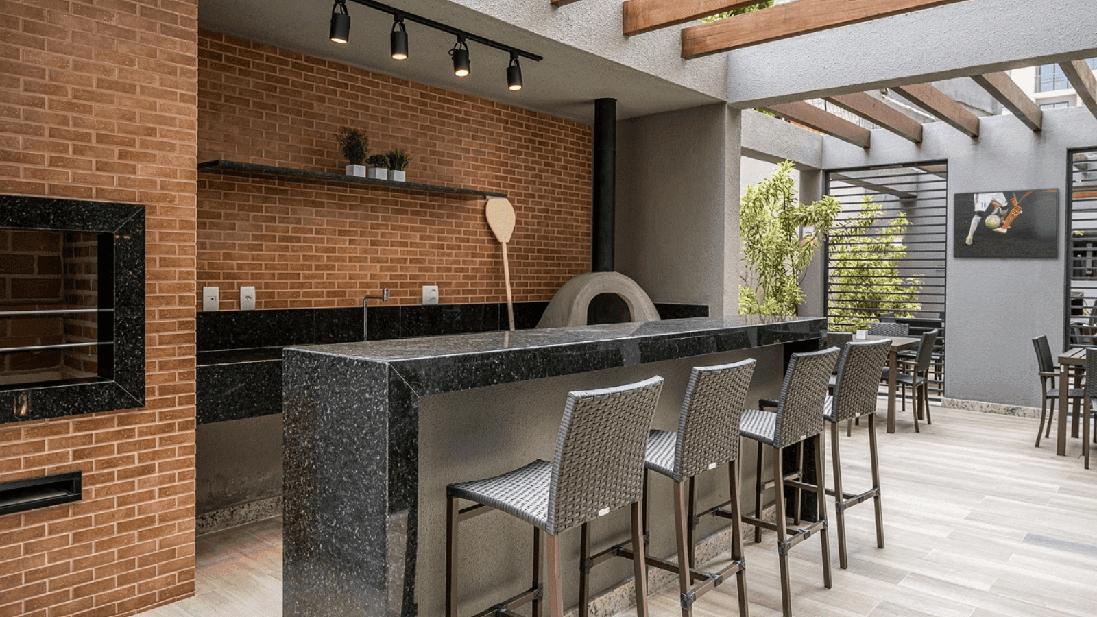 Foto real da Churrasqueira/forno de pizza